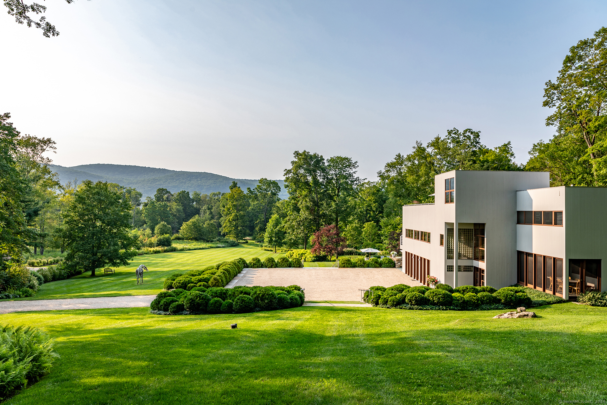 23 Mauwee Brook Road Kent, CT 06757 - Photo 2 of 40 a view of building with yard