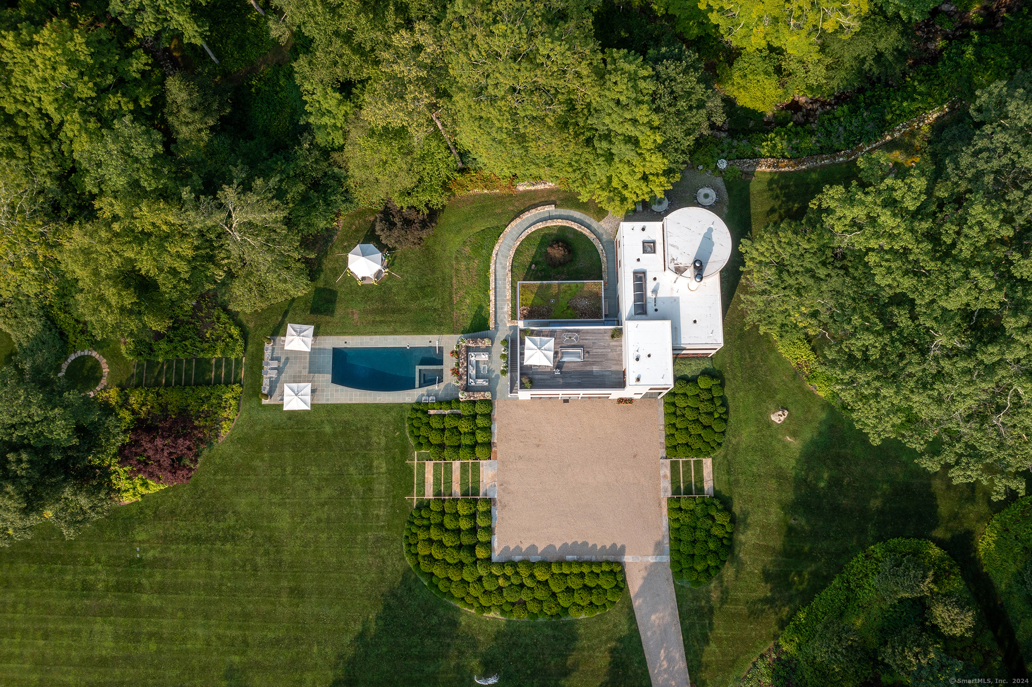 23 Mauwee Brook Road Kent, CT 06757 - Photo 26 of 40 a front view of a house with garden