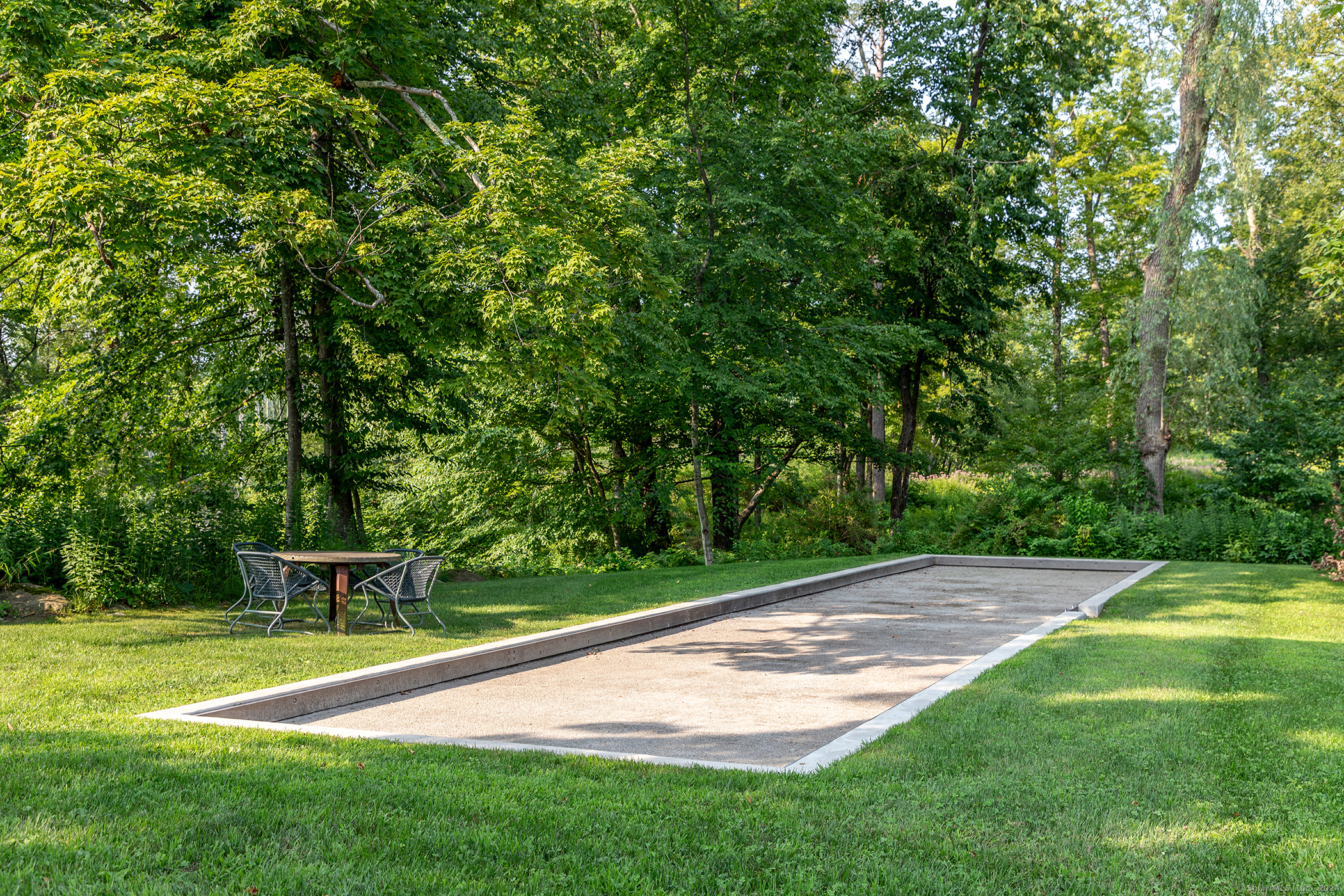 23 Mauwee Brook Road Kent, CT 06757 - Photo 40 of 40 a view of a backyard with a garden
