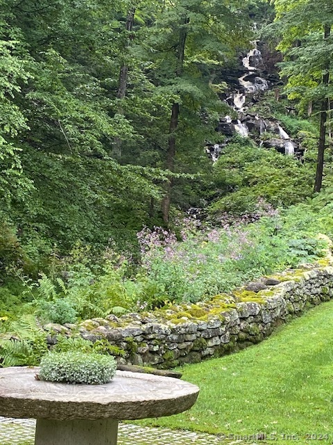 23 Mauwee Brook Road Kent, CT 06757 - Photo 6 of 40 a view of a garden with a lake
