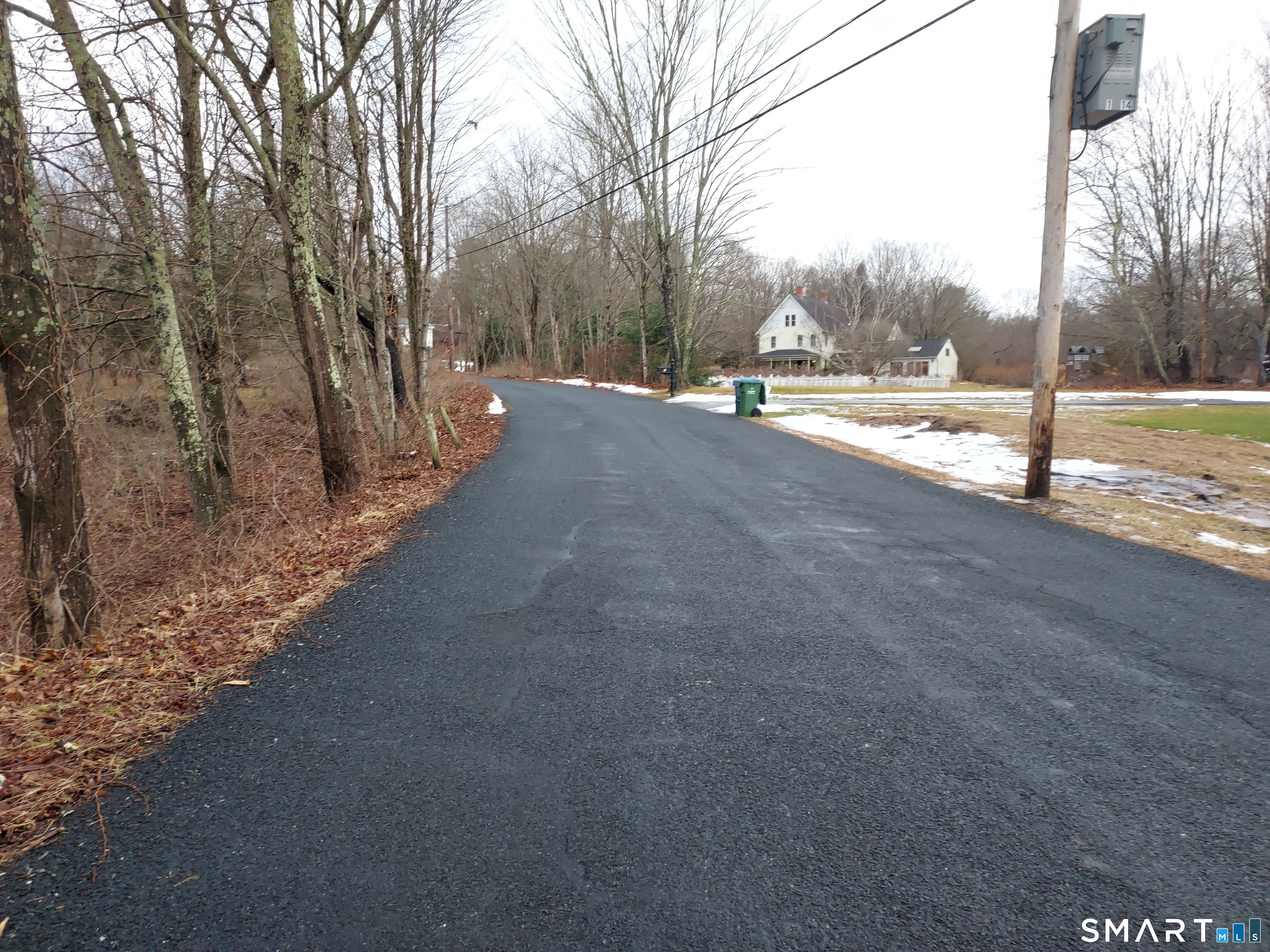 8 Times Farm Road Andover, CT 06232 - Photo 5 of 5 a view of a road with a yard