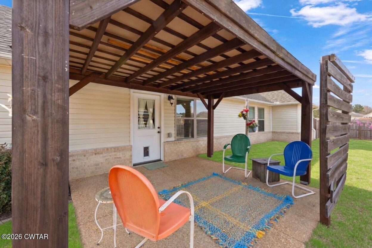 3102 Fawn Ridge Cove Humboldt, TN 38343 - Photo 19 of 20 a view of porch with seating space
