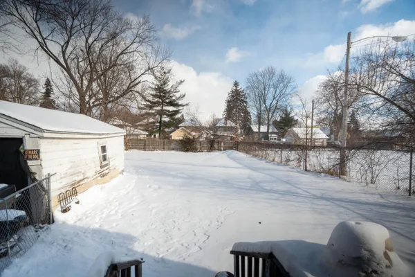 $100,000 | 734 North Martin Luther King Jr Boulevard, Lansing, MI 48915