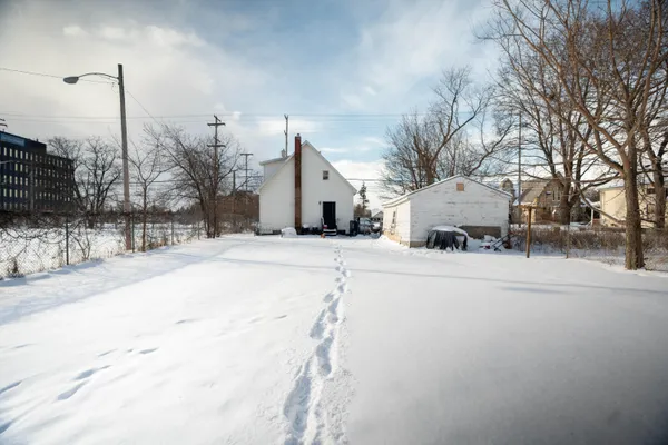 $100,000 | 734 North Martin Luther King Jr Boulevard, Lansing, MI 48915