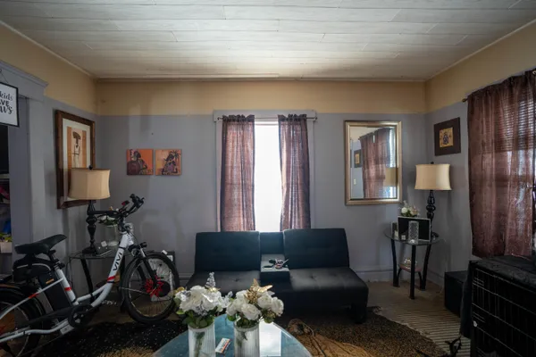 $100,000 | 734 North Martin Luther King Jr Boulevard, Lansing, MI 48915