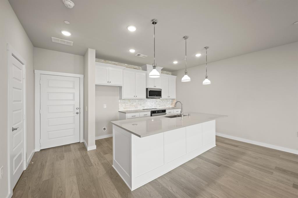 4606 White Buffalo Trail Oak Point, TX 75068 - Photo 11 of 31 4606 White Buffalo_2220_Aspen- Kitchen-2