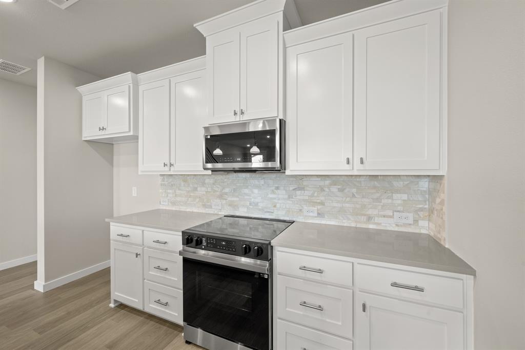 4606 White Buffalo Trail Oak Point, TX 75068 - Photo 13 of 31 4606 White Buffalo_2220_Aspen- Kitchen-4