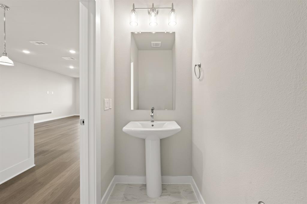 4606 White Buffalo Trail Oak Point, TX 75068 - Photo 14 of 31 4606 White Buffalo_2220_Aspen- Half Bath-1