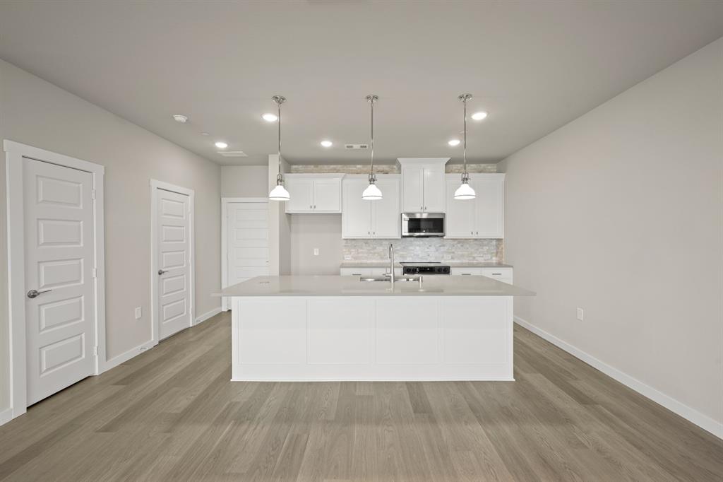 4606 White Buffalo Trail Oak Point, TX 75068 - Photo 10 of 31 4606 White Buffalo_2220_Aspen- Kitchen-1