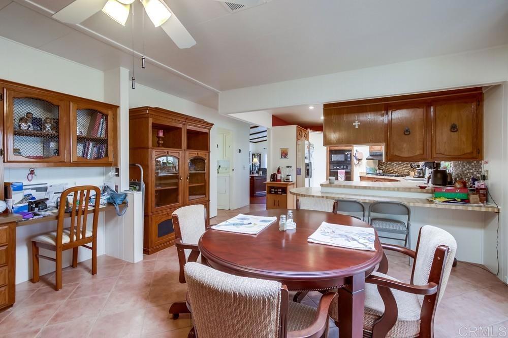 1175 La Moree Road, Unit 52 San Marcos, CA 92078 - Photo 15 of 54 a view of a dining room with furniture