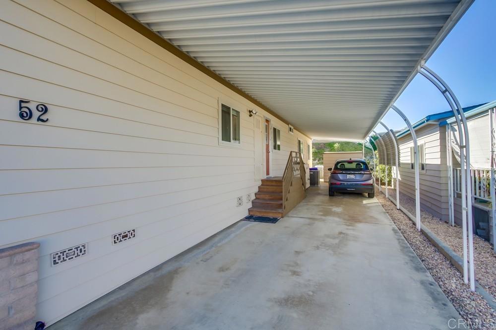 1175 La Moree Road, Unit 52 San Marcos, CA 92078 - Photo 38 of 54 a view of car parked in back yard