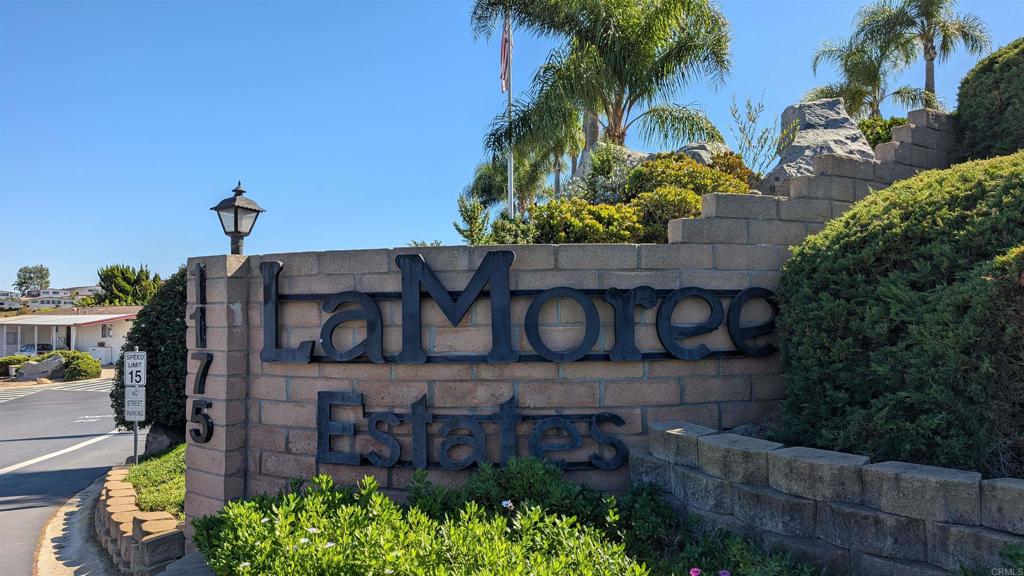 1175 La Moree Road, Unit 52 San Marcos, CA 92078 - Photo 40 of 54 a street sign that is on a wooden wall