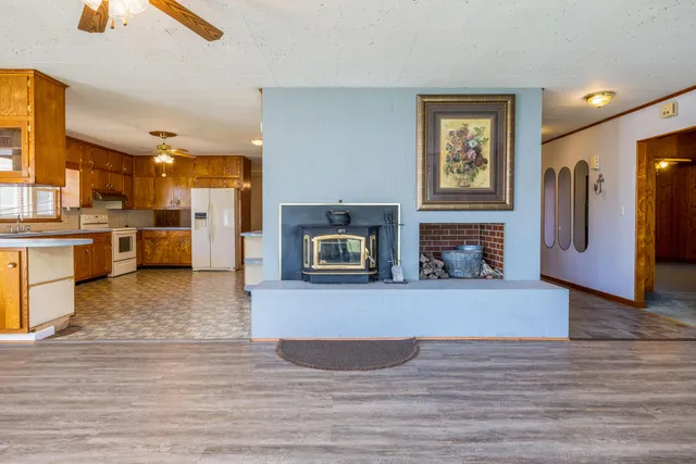a view of a swimming pool with an outdoor space and seating area
