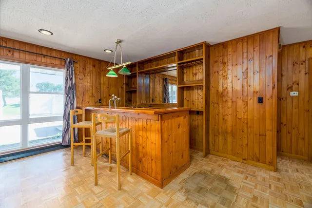 a bathroom with a shower and a tub