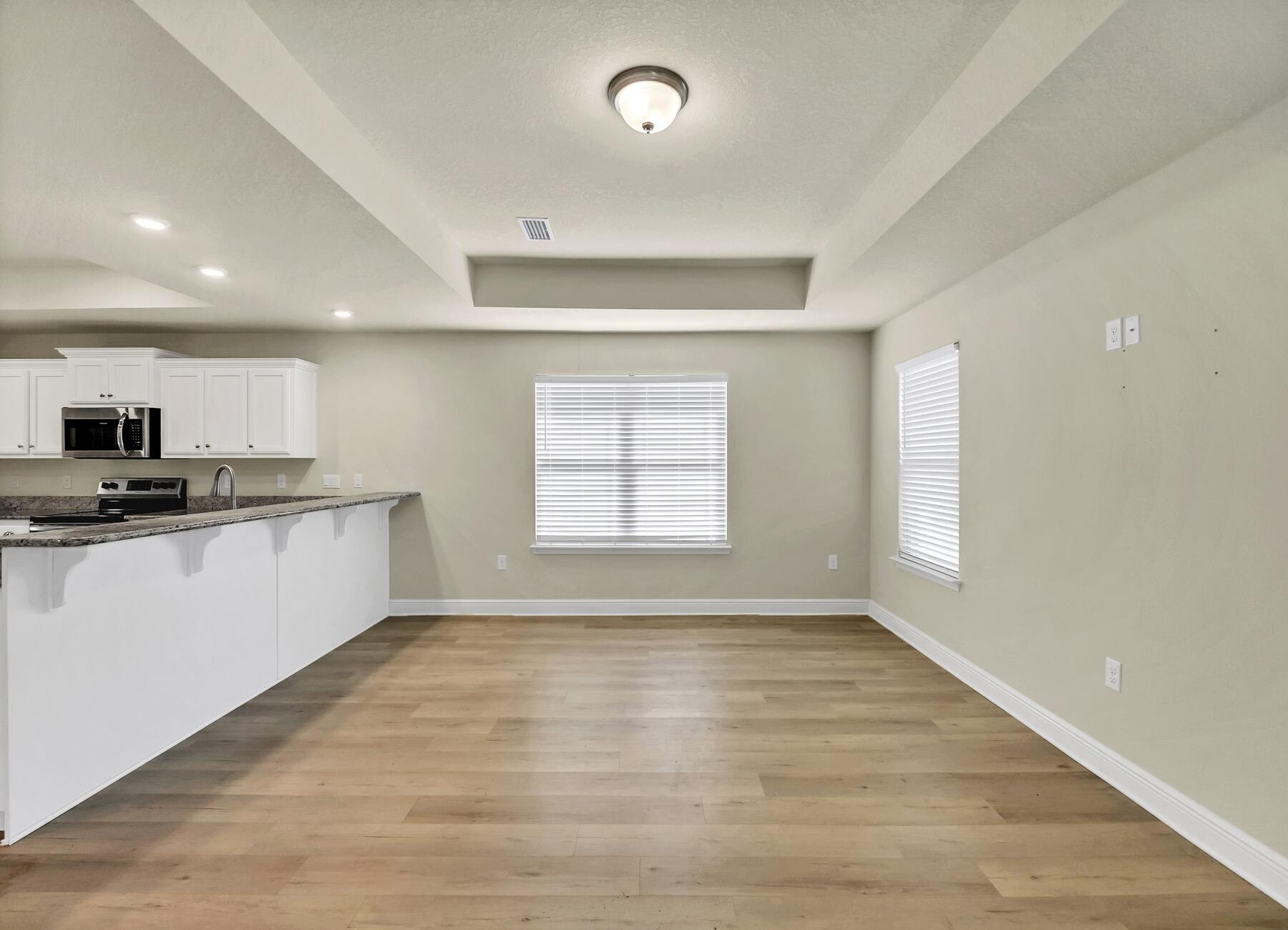 3639 Ranch Drive Crestview, FL 32539 - Photo 36 of 84 a view of kitchen with granite countertop stainless steel appliances sink and cabinets