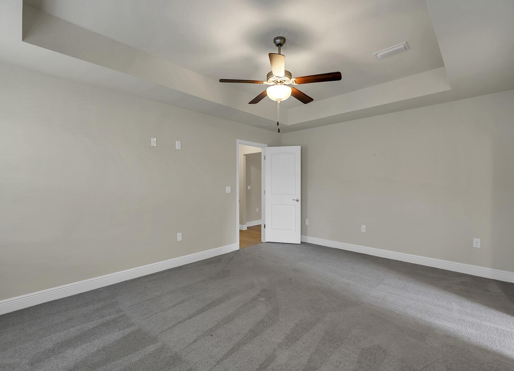 3639 Ranch Drive Crestview, FL 32539 - Photo 52 of 84 an empty room with a window and a ceiling fan