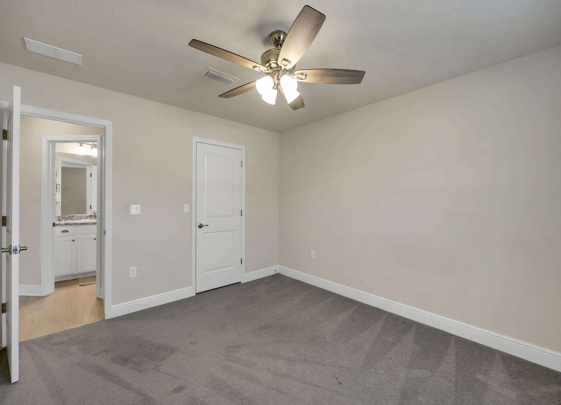 3639 Ranch Drive Crestview, FL 32539 - Photo 59 of 84 wooden floor in an empty room and a ceiling fan