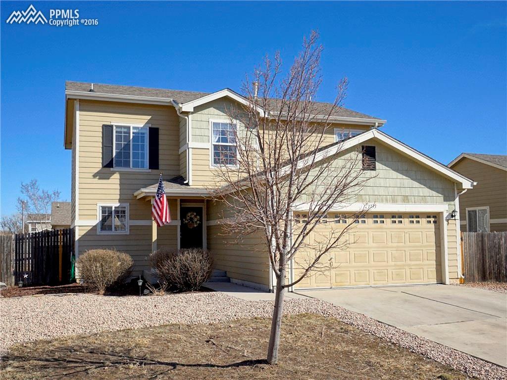 1733 Keswick Road Colorado Springs, CO 80906 - Photo 1 of 13 Exterior front of Move-In Ready 2-story home!