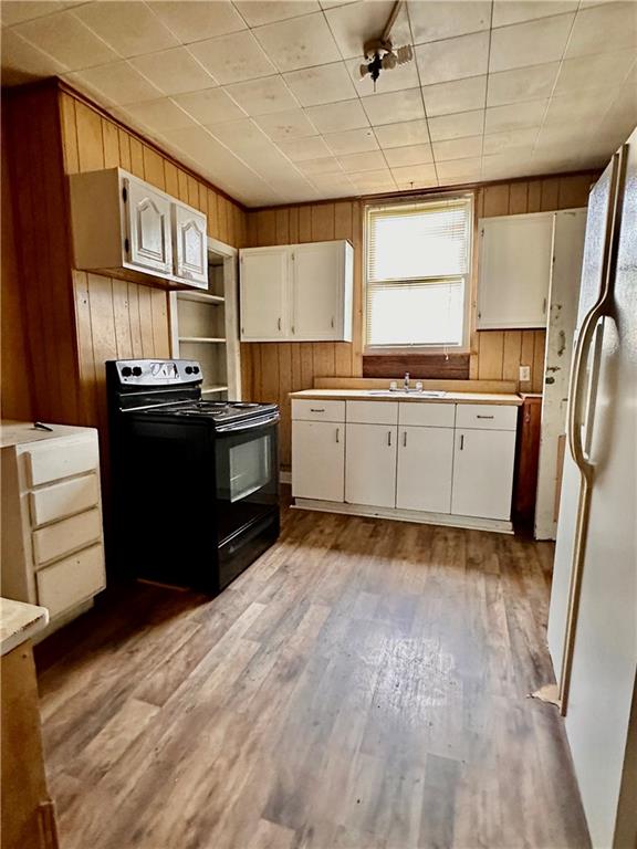 16 3rd Street Charleroi, PA 15022 - Photo 3 of 9 a kitchen with a stove a refrigerator and cabinets