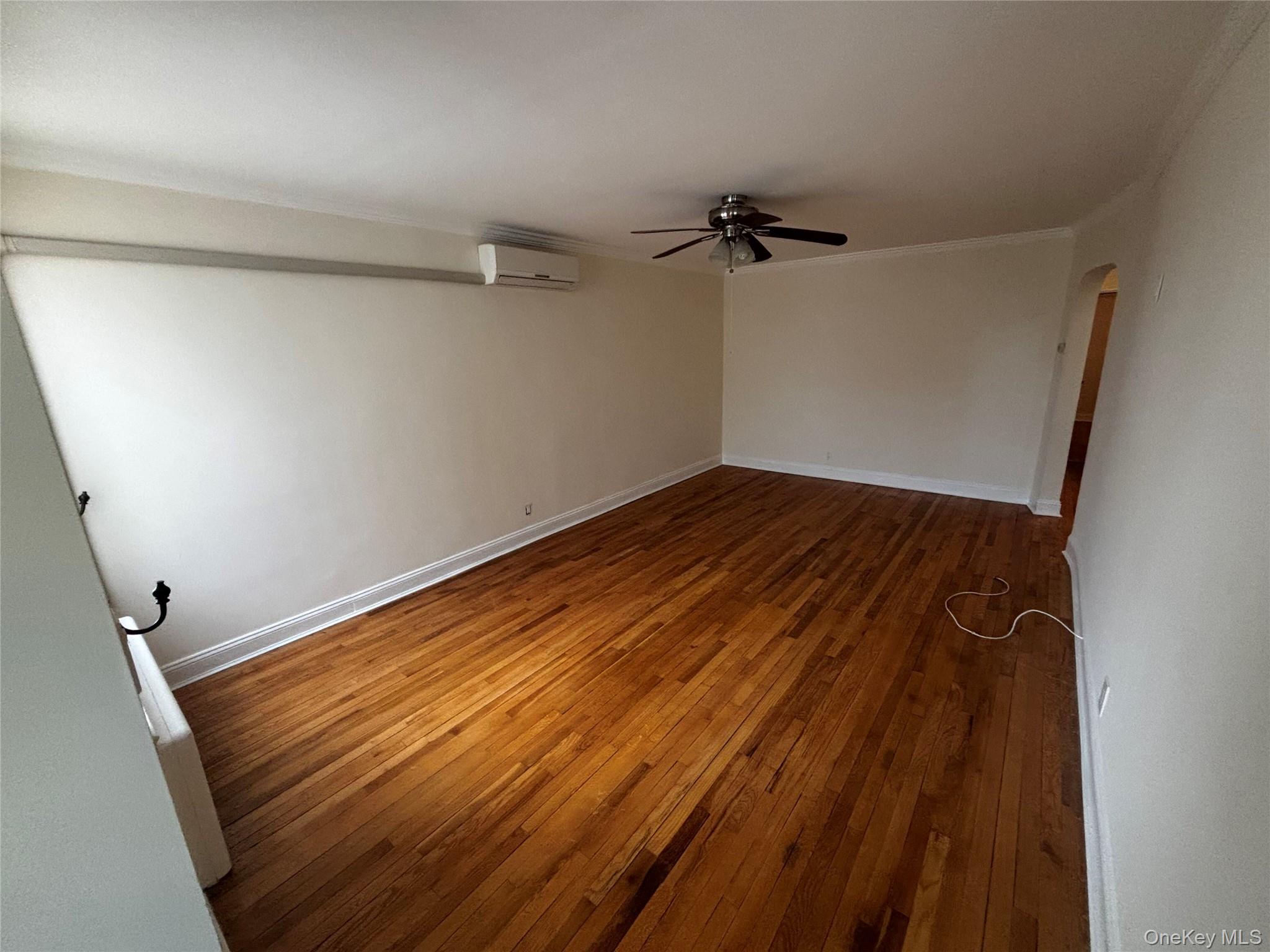 253-29 85th Road Queens, NY 11426 - Photo 3 of 8 a view of a room with wooden floor
