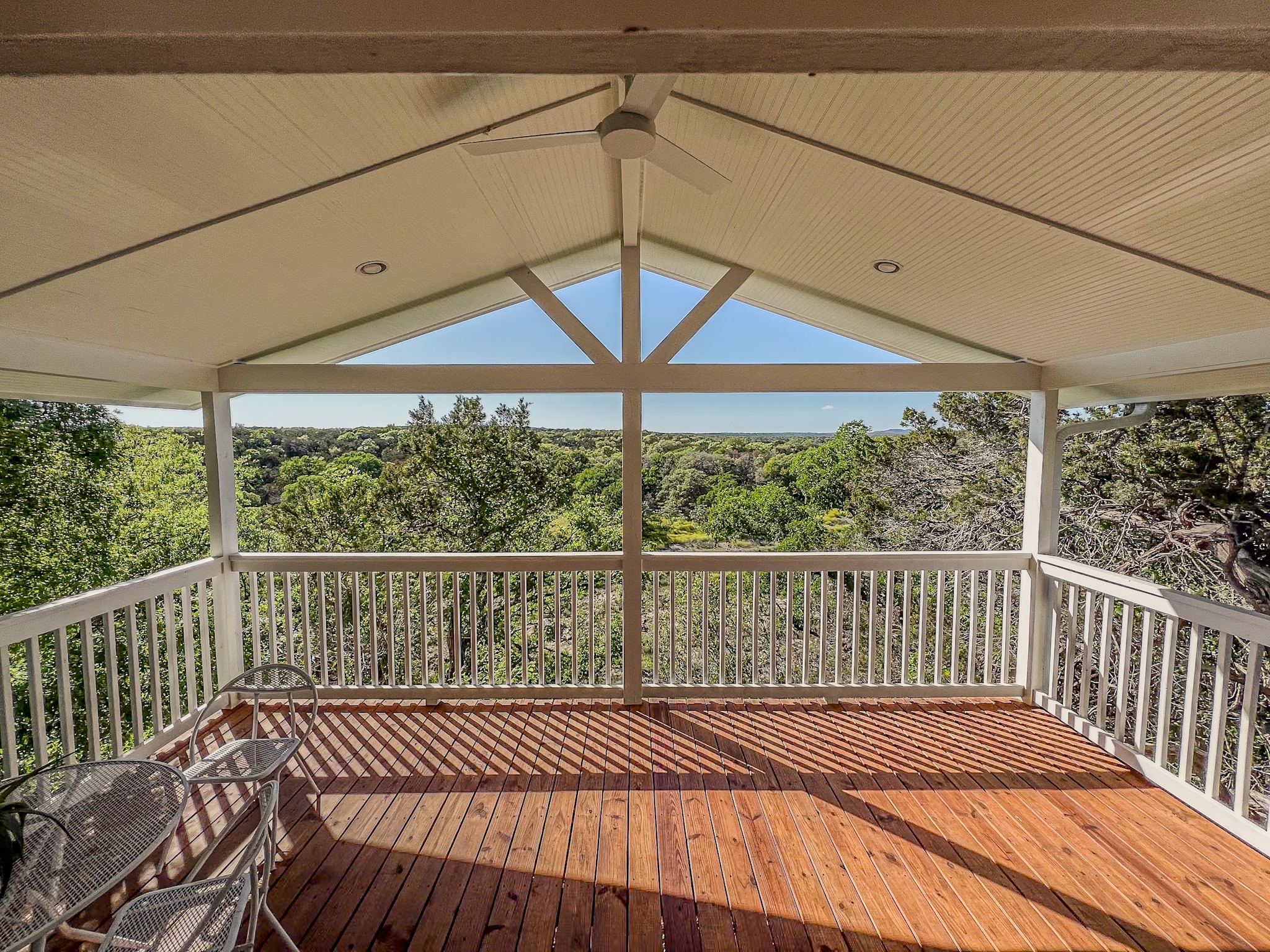 550 Cliffside Road Wimberley, TX 78676 - Photo 12 of 35 a view of a balcony with wooden floor