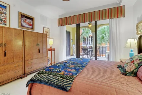 a bathroom with a granite countertop sink a mirror and a shower