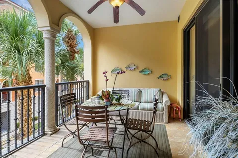 a view of a balcony dining area