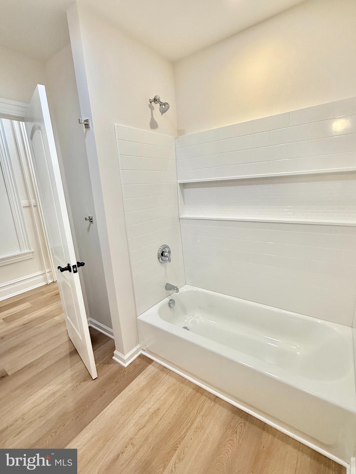 123 North Hanover Street, Unit 1 Pottstown, PA 19464 - Photo 11 of 22 a bathroom with a bathtub and a shower