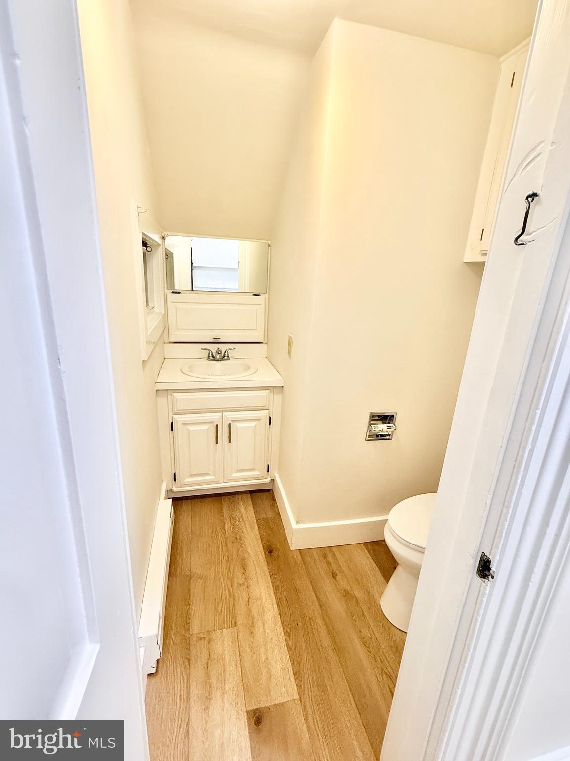 123 North Hanover Street, Unit 1 Pottstown, PA 19464 - Photo 12 of 22 a bathroom with a sink a toilet a tub and shower