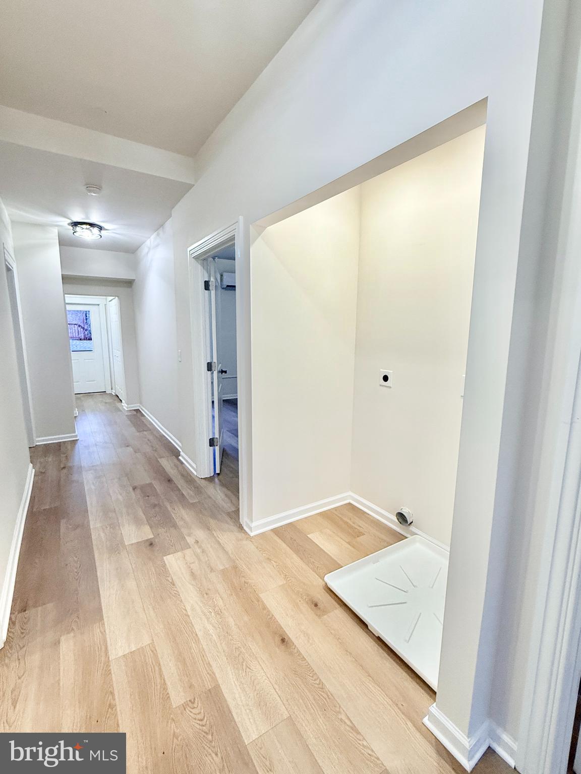 123 North Hanover Street, Unit 1 Pottstown, PA 19464 - Photo 14 of 22 a view of a hallway with wooden floor and cabinet