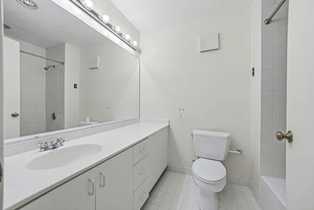 a bathroom with a shower curtain