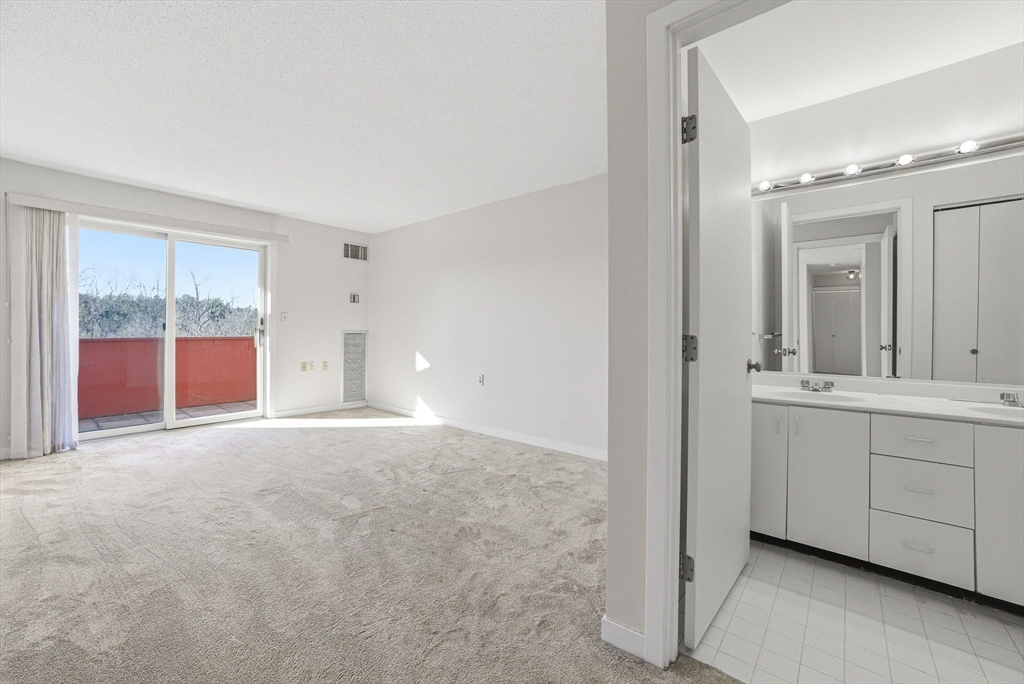 100 Rosemary Way, Unit 324 Needham, MA 02494 - Photo 9 of 27 a view of an empty room