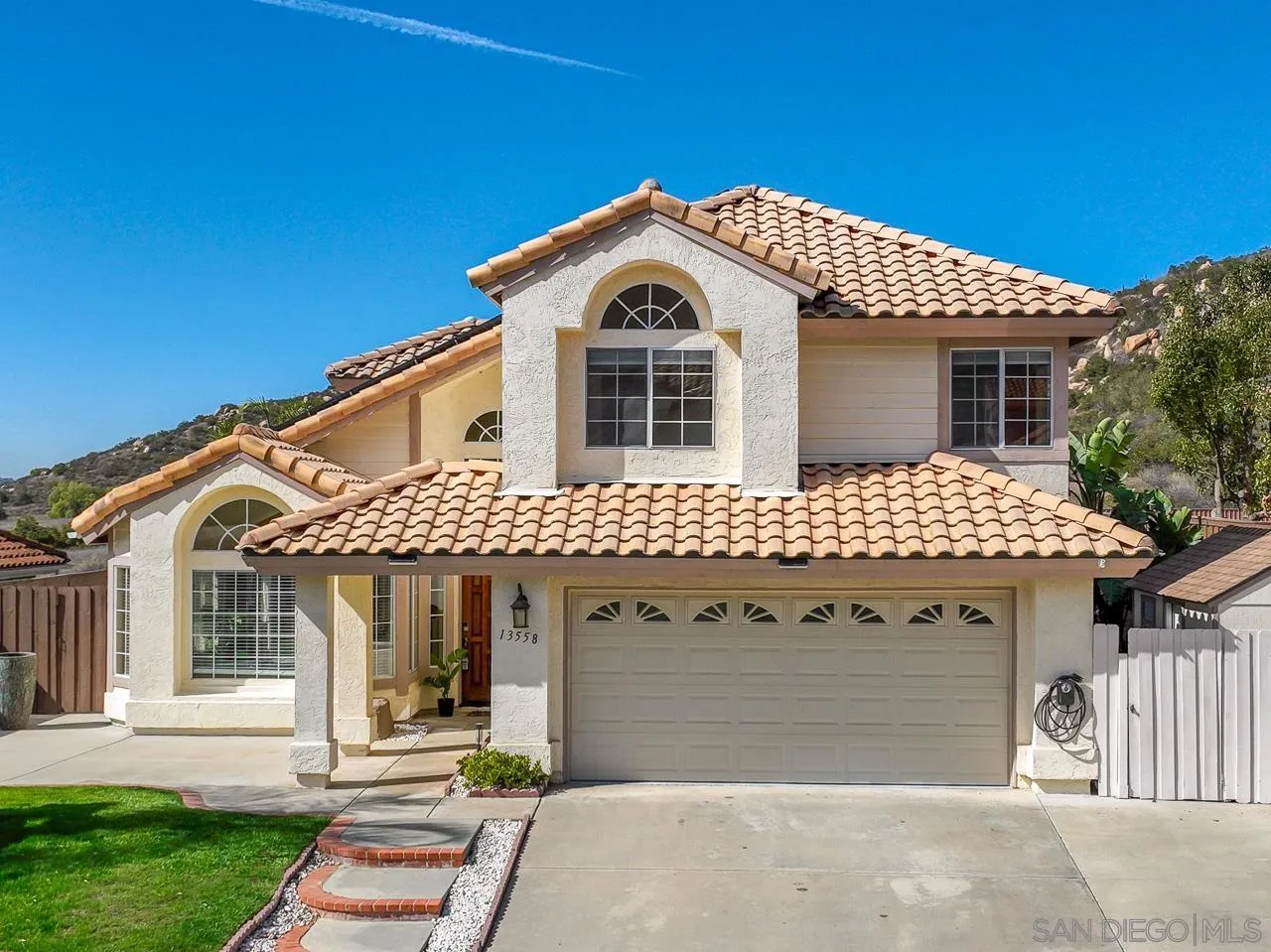 13558 Quiet Hills Drive Poway, CA 92064 - Photo 1 of 61 a front view of a house