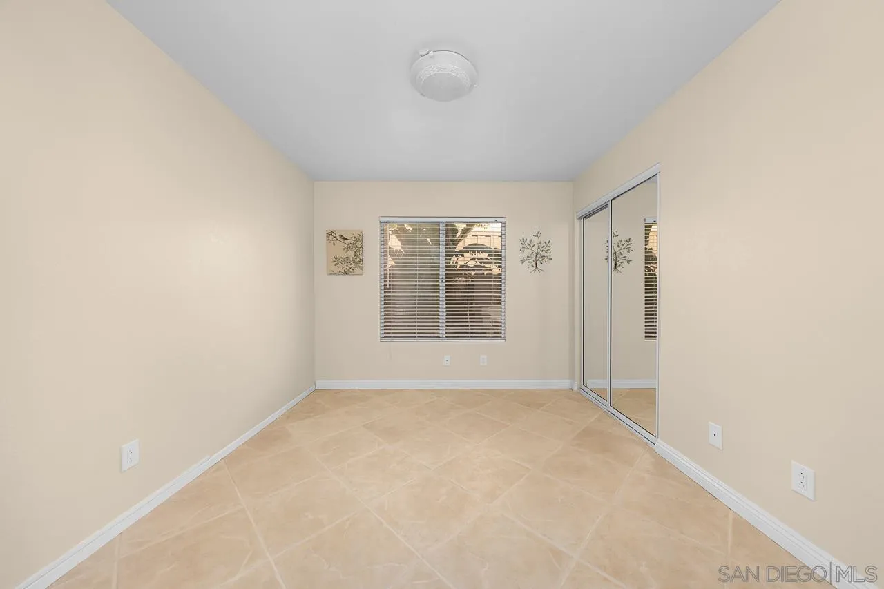 13558 Quiet Hills Drive Poway, CA 92064 - Photo 19 of 61 a view of an empty room with a window