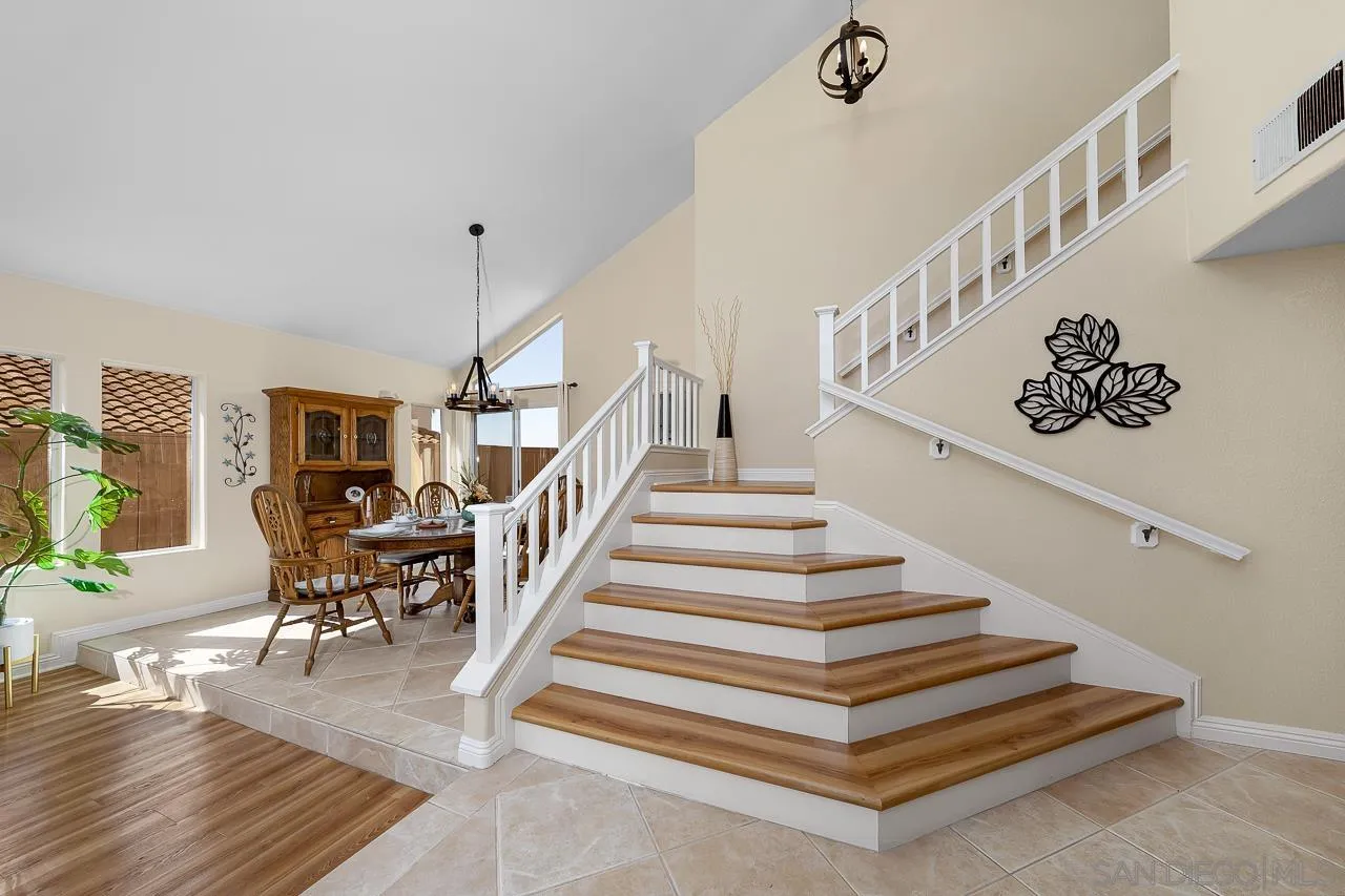 13558 Quiet Hills Drive Poway, CA 92064 - Photo 22 of 61 a view of entryway and hall with wooden floor