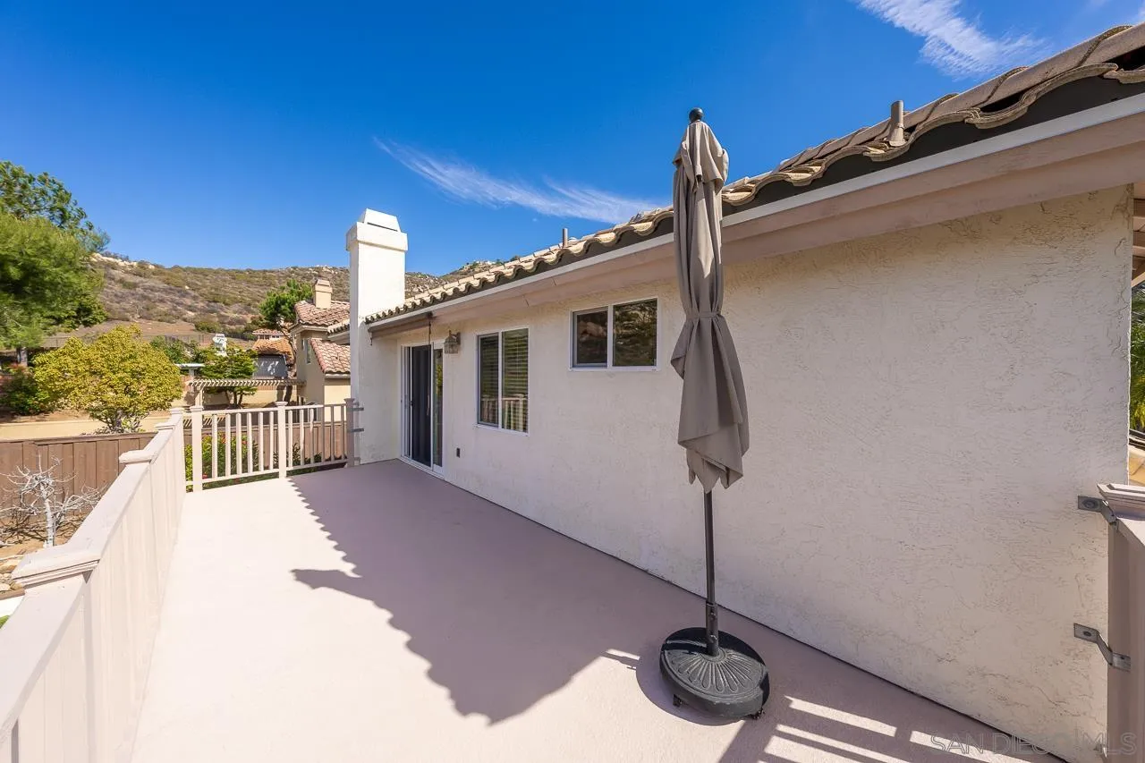 13558 Quiet Hills Drive Poway, CA 92064 - Photo 27 of 61 a very nice looking house with wooden fence