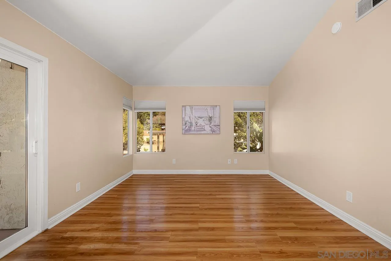 13558 Quiet Hills Drive Poway, CA 92064 - Photo 28 of 61 a view of room with window and wooden floor