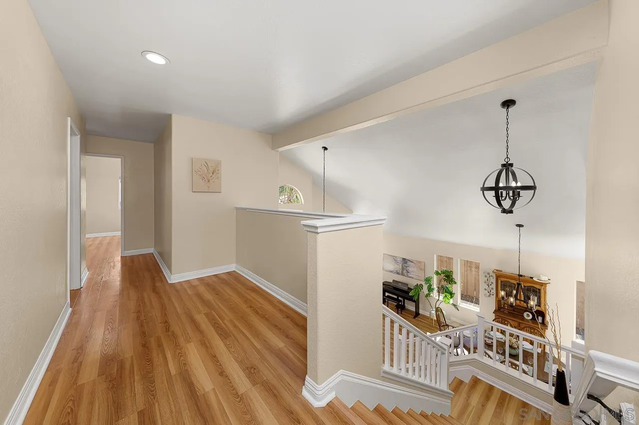 13558 Quiet Hills Drive Poway, CA 92064 - Photo 34 of 61 a living room with furniture and a wooden floor