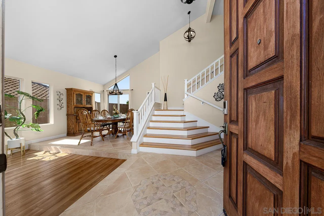 13558 Quiet Hills Drive Poway, CA 92064 - Photo 4 of 61 a view of entryway livingroom and hall with wooden floor