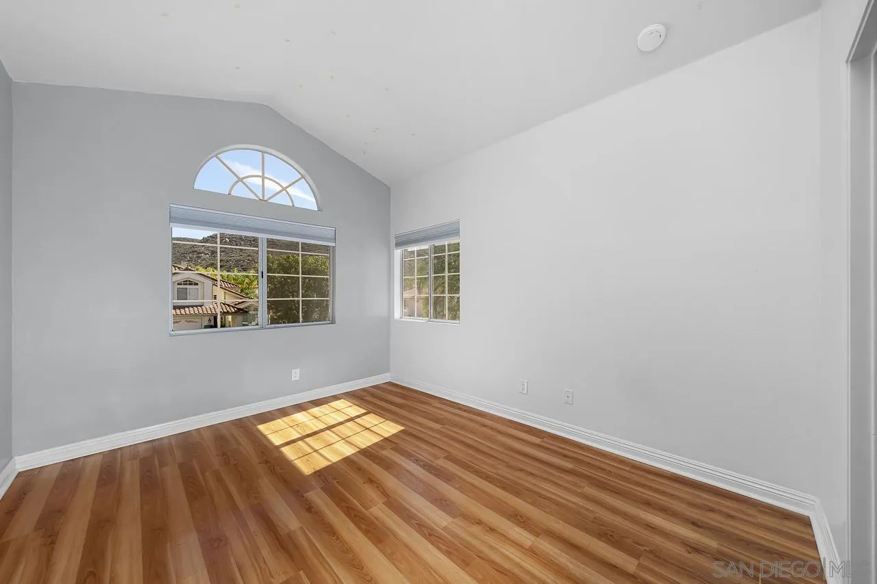 13558 Quiet Hills Drive Poway, CA 92064 - Photo 41 of 61 an empty room with windows