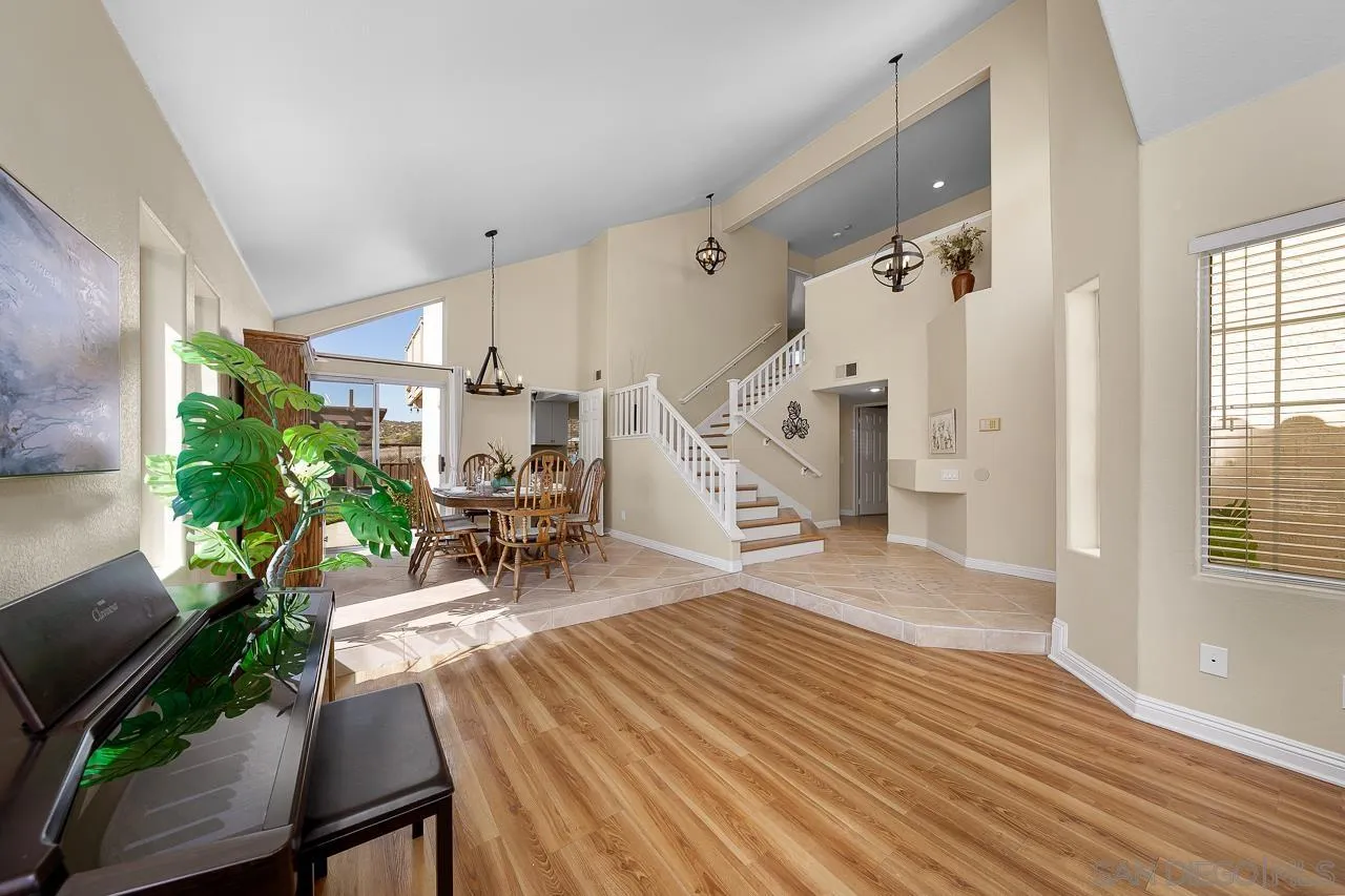 13558 Quiet Hills Drive Poway, CA 92064 - Photo 5 of 61 a living room with furniture and a table
