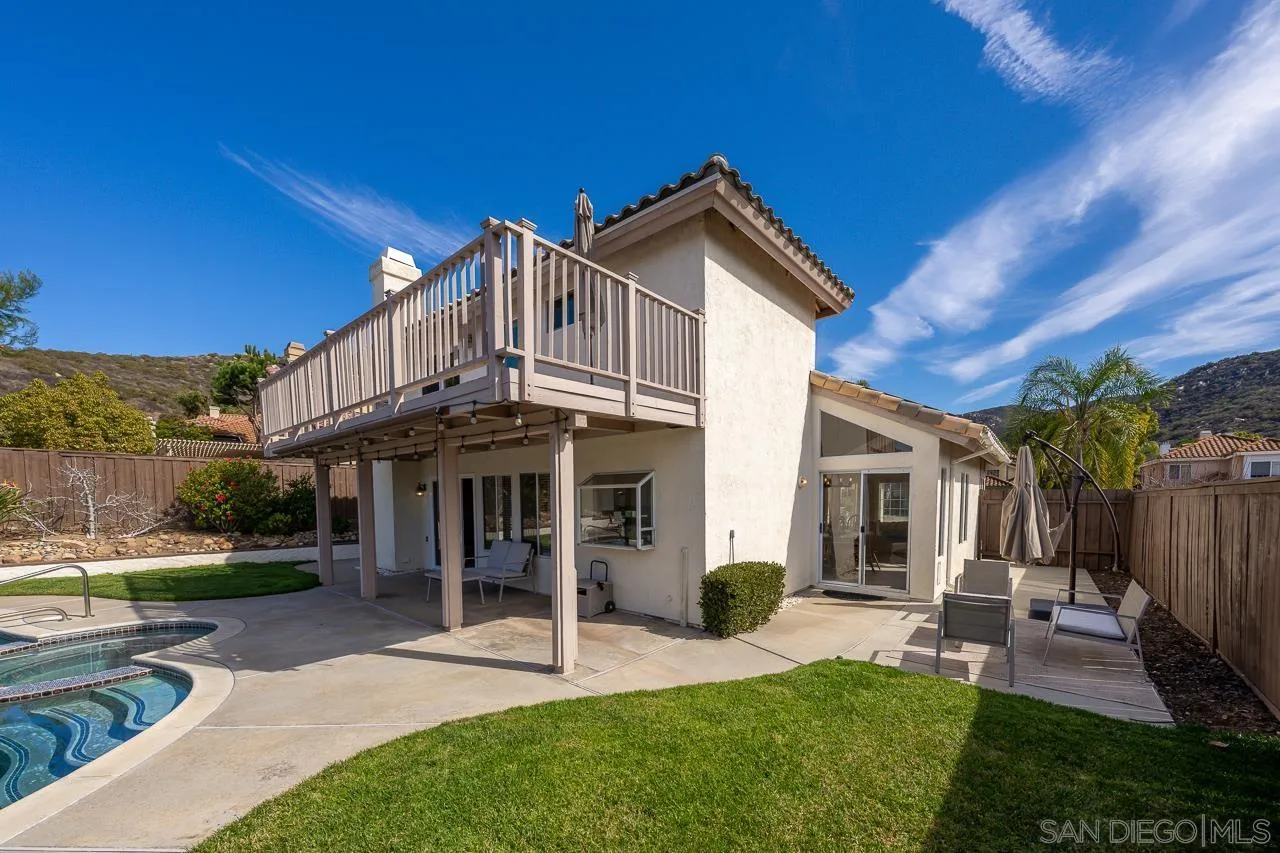 13558 Quiet Hills Drive Poway, CA 92064 - Photo 52 of 61 a view of a house with a yard porch and sitting area