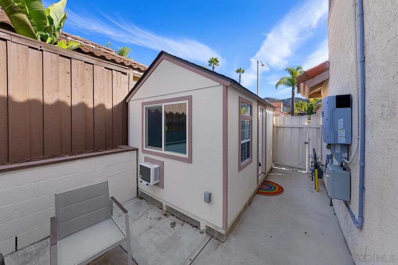 13558 Quiet Hills Drive Poway, CA 92064 - Photo 53 of 61 a view of a house with backyard and furniture
