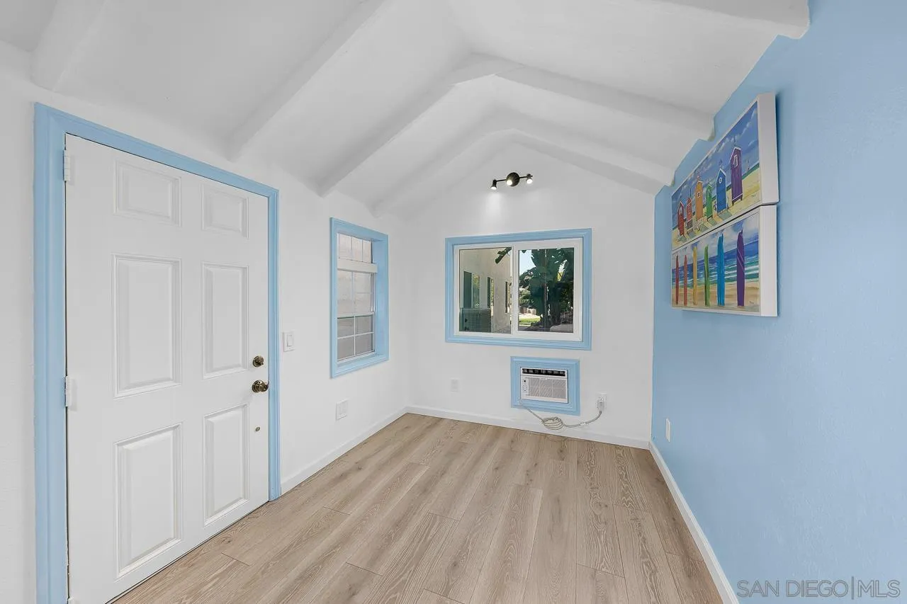 13558 Quiet Hills Drive Poway, CA 92064 - Photo 55 of 61 wooden floor in an empty room with a window