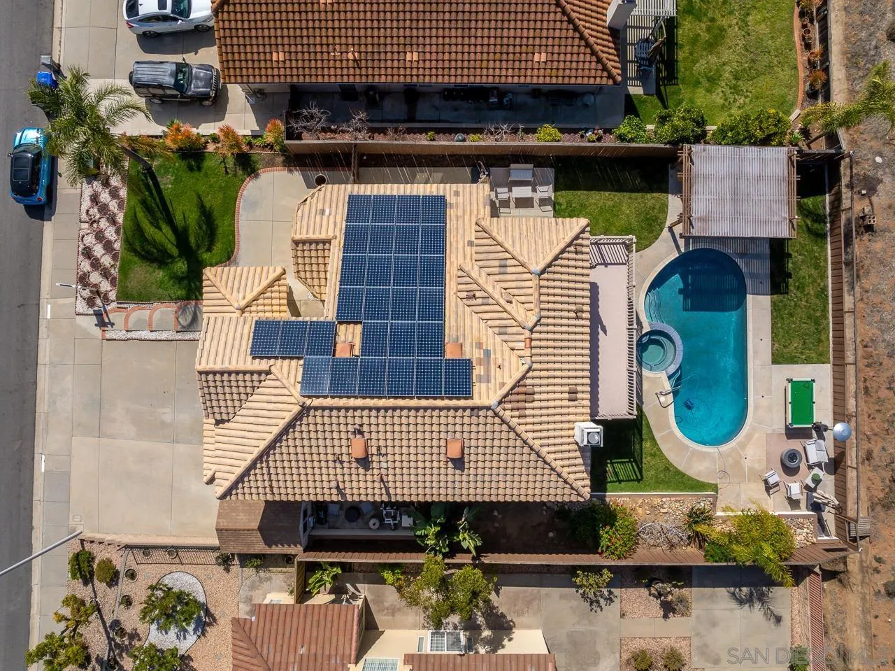 13558 Quiet Hills Drive Poway, CA 92064 - Photo 58 of 61 an aerial view of a house with a swimming pool