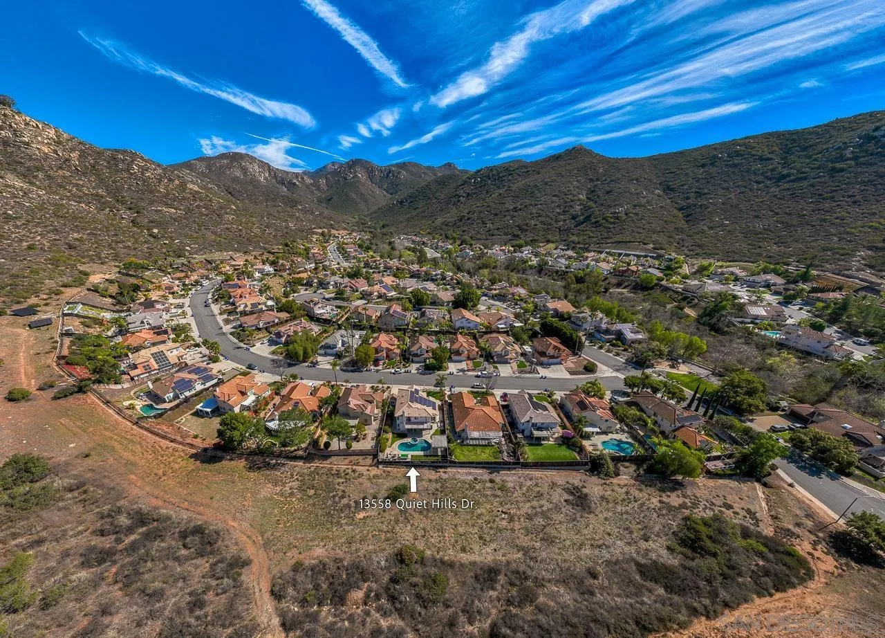 13558 Quiet Hills Drive Poway, CA 92064 - Photo 59 of 61 a view of a city with a mountain in the background