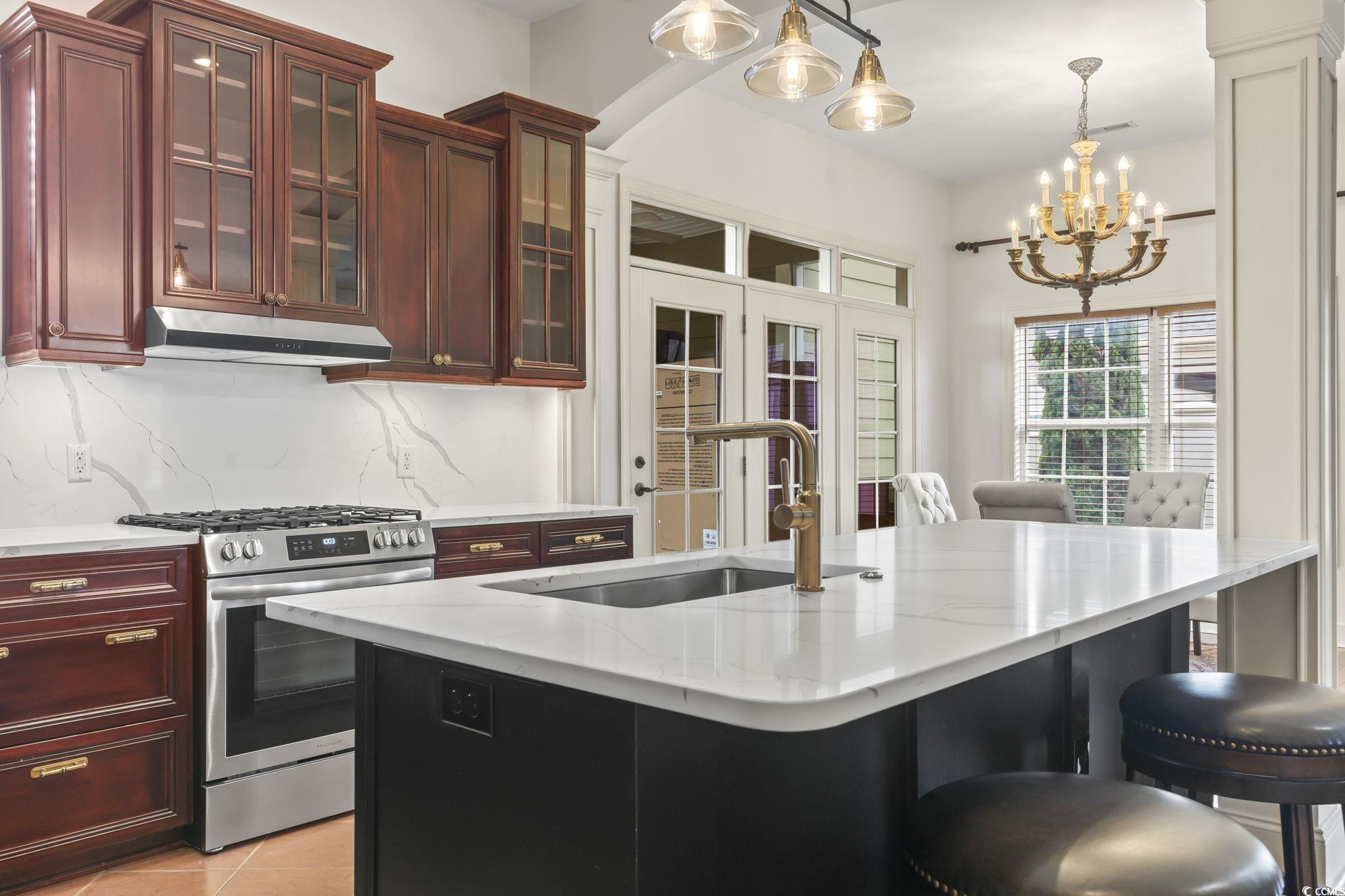 853 Bluffview Drive Myrtle Beach, SC 29579 - Photo 11 of 40 Kitchen with stainless steel range with gas cookto