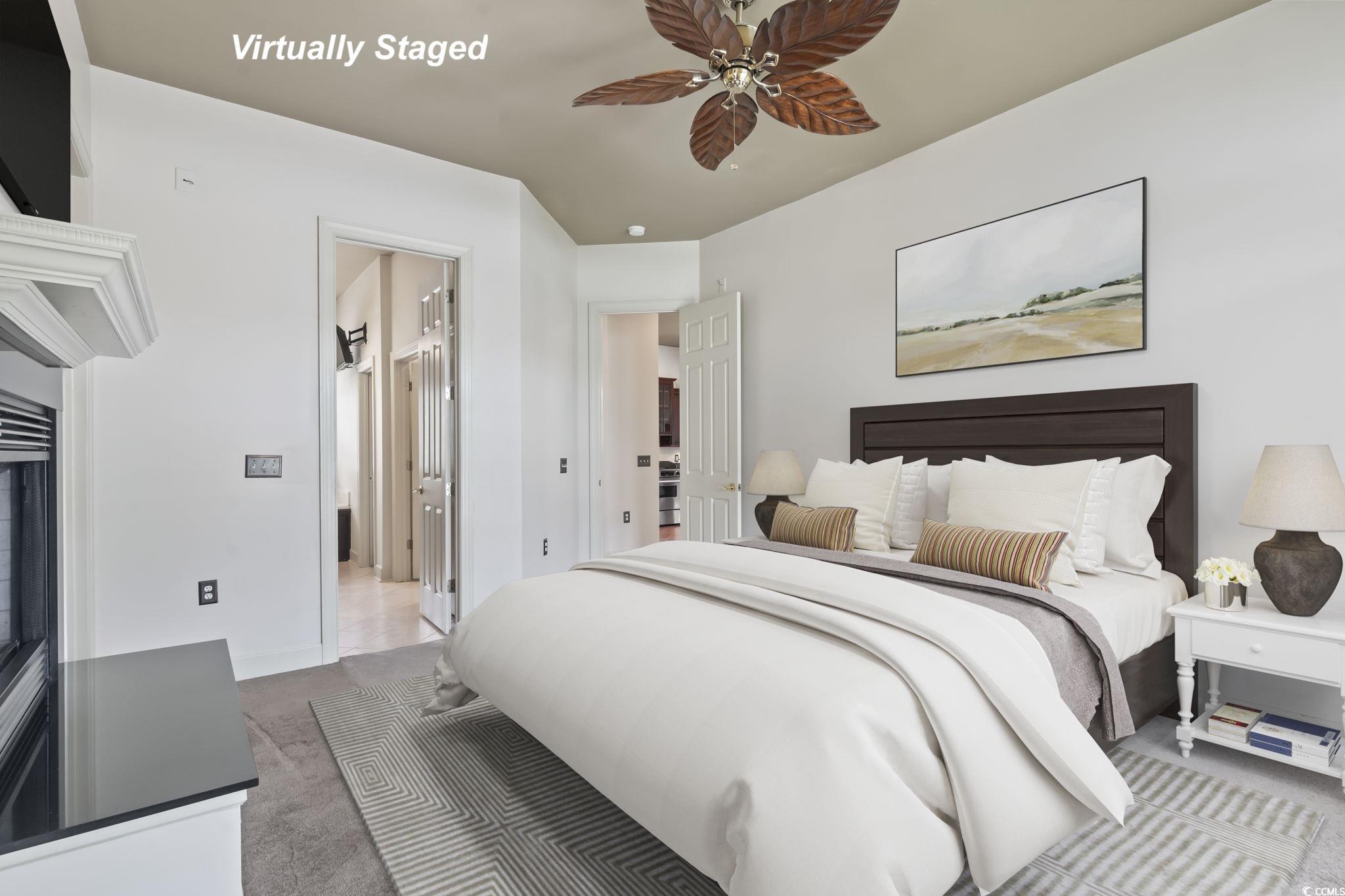 853 Bluffview Drive Myrtle Beach, SC 29579 - Photo 17 of 40 Carpeted bedroom with a ceiling fan