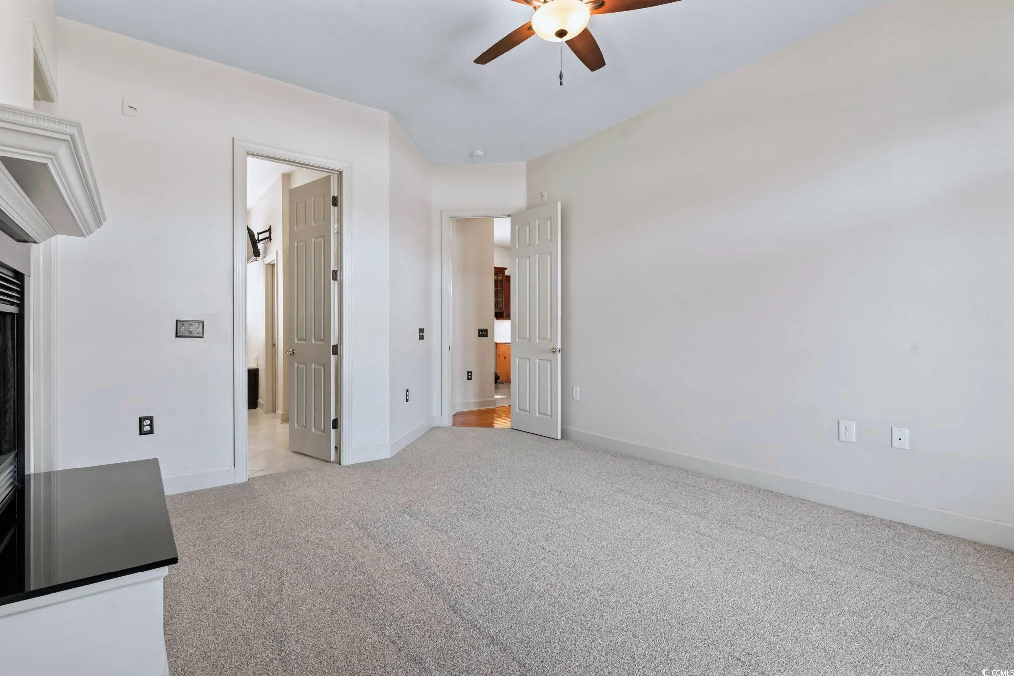 853 Bluffview Drive Myrtle Beach, SC 29579 - Photo 19 of 40 Unfurnished bedroom featuring light carpet, ceilin