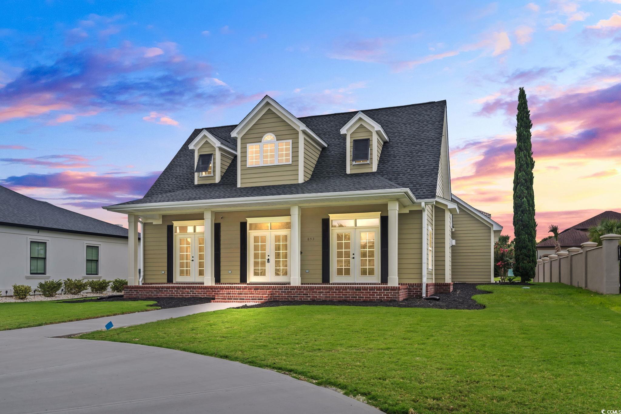 853 Bluffview Drive Myrtle Beach, SC 29579 - Photo 33 of 40 View of front facade with a yard